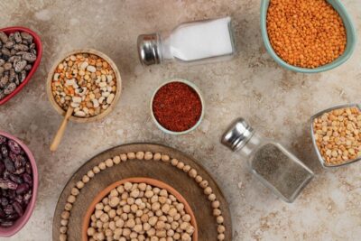 wooden-bowl-full-unprepared-peas-with-spices-beans