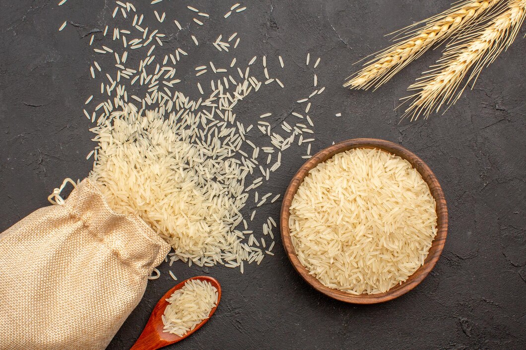 top-view-raw-rice-inside-bag-plate-grey-surface_140725-90597
